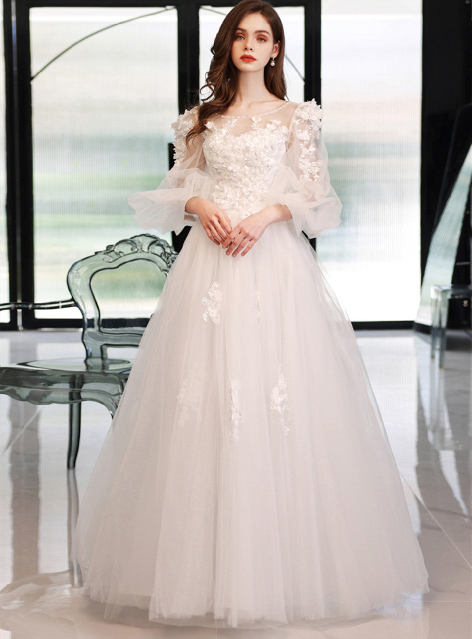 Sophisticated Ivory French Lace and Tulle Ballgown wedding dress with fitted sleeves